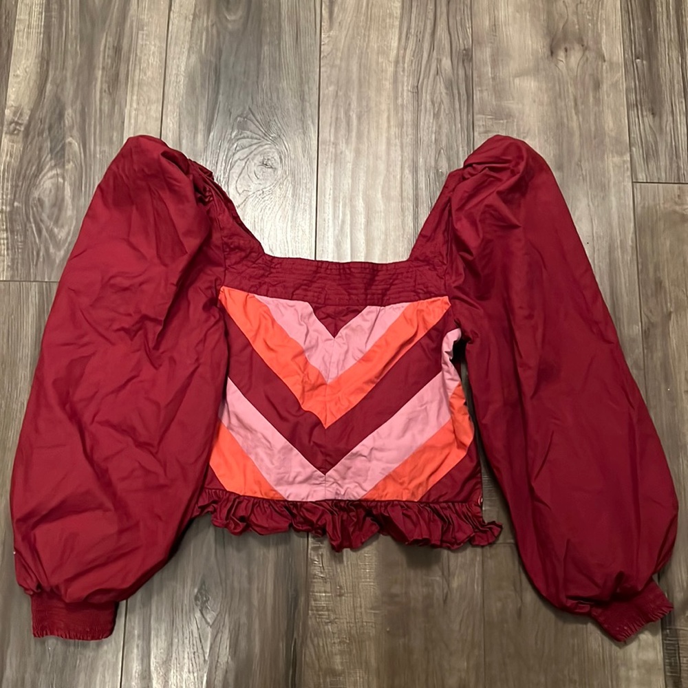 Love the Label top in merlot with front multi inset and ruched back/side zip